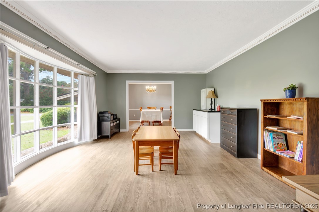12073 Highway 130 Fairmont, NC 28340 - Photo 22 of 45 a living room with furniture and a large window