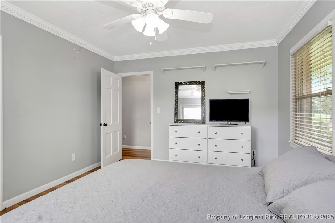 12073 Highway 130 Fairmont, NC 28340 - Photo 28 of 45 a living room with furniture and a flat screen tv