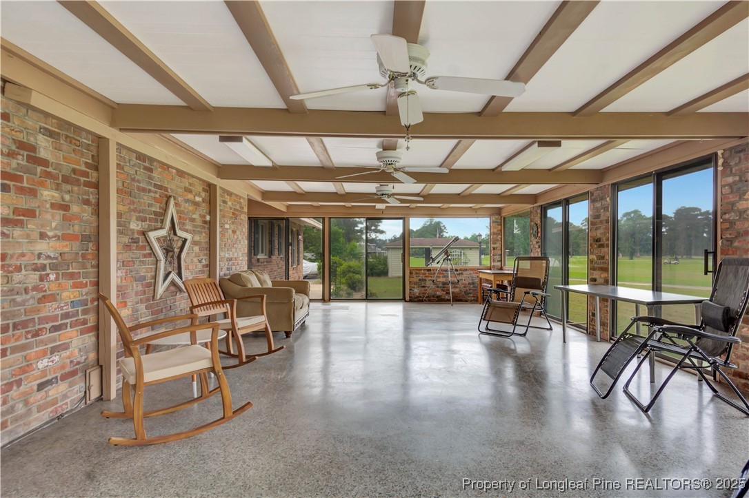 12073 Highway 130 Fairmont, NC 28340 - Photo 37 of 45 a view of a hall with living room and dining room