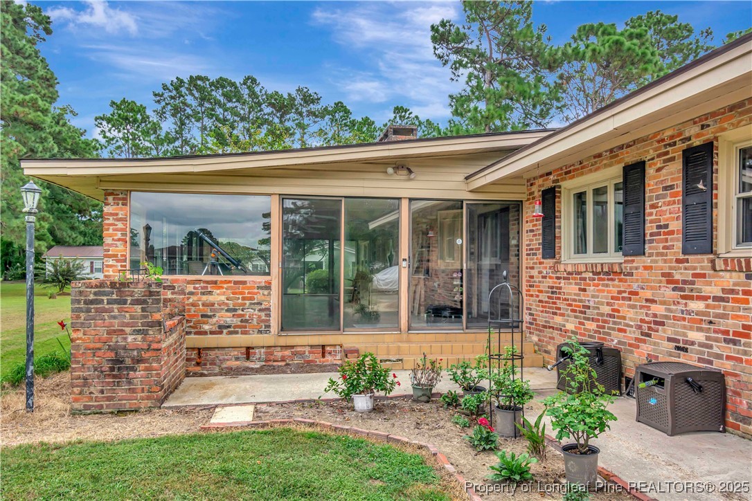12073 Highway 130 Fairmont, NC 28340 - Photo 40 of 45 front view of a house with a garden