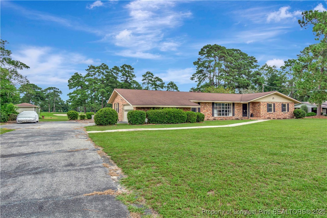 12073 Highway 130 Fairmont, NC 28340 - Photo 4 of 45 a front view of house with yard and green space
