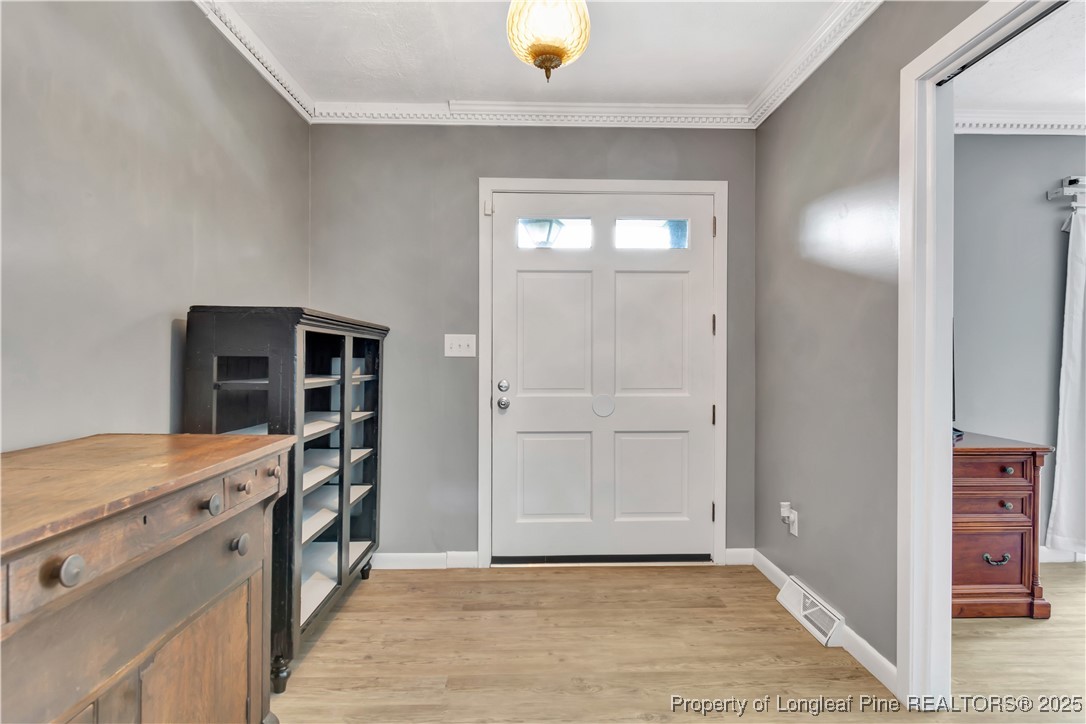 12073 Highway 130 Fairmont, NC 28340 - Photo 6 of 45 a view of kitchen with washer and dryer