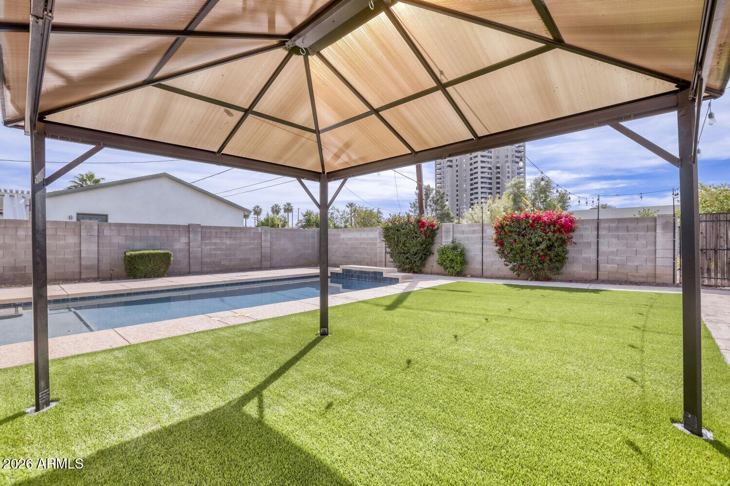 1005 East Weldon Avenue Phoenix, AZ 85014 - Photo 31 of 33 Shade Cover in Backyard