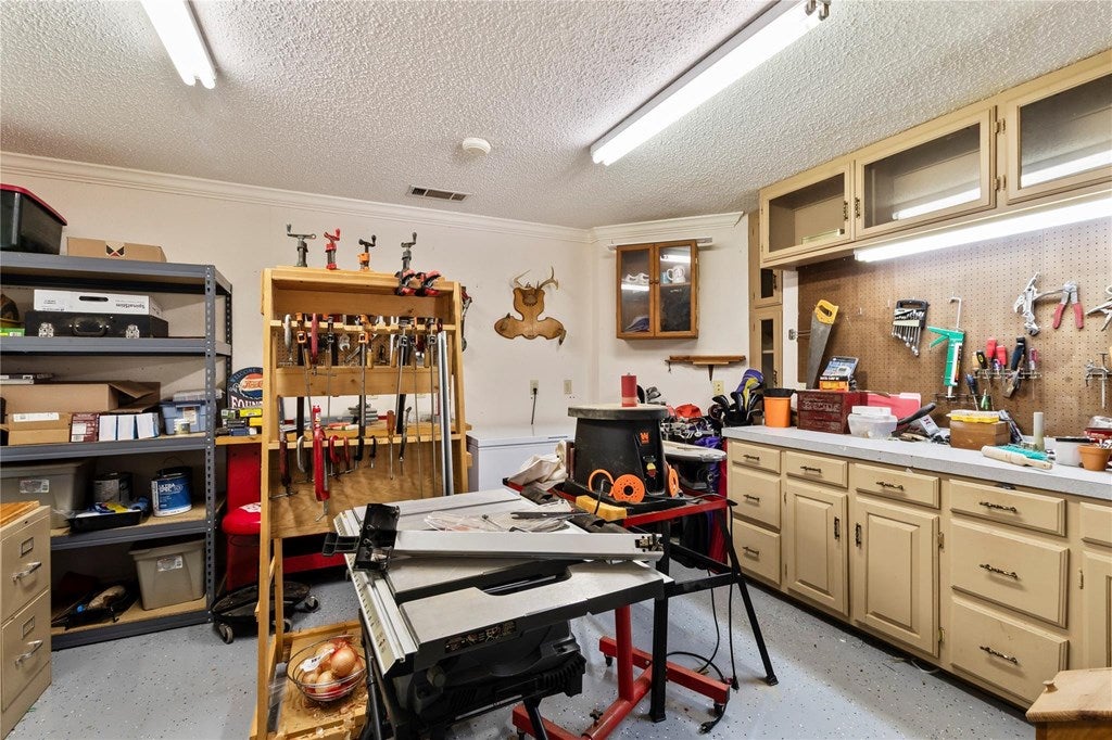 102 Foster Ranch Road Trinidad, TX 75163 - Photo 28 of 39 195 sq ft HVAC Workshop in garage.