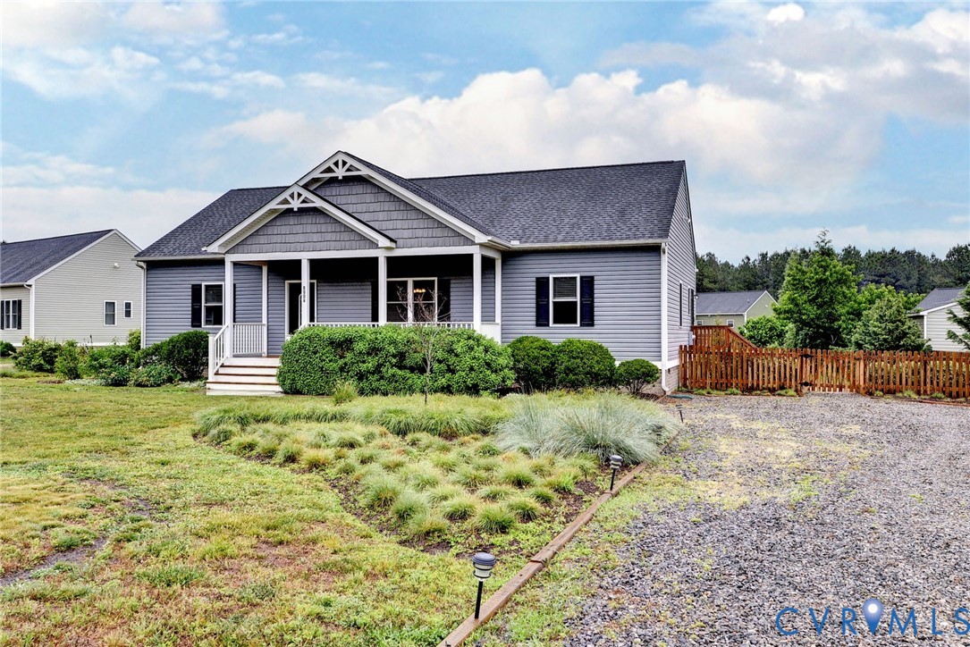 8904 Rock Cedar Road New Kent, VA 23124 - Photo 37 of 37 a front view of a house with a yard
