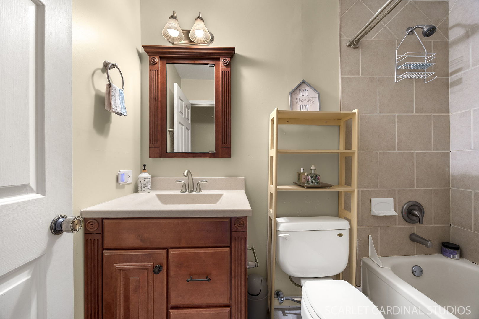 2044 Templar Drive Naperville, IL 60565 - Photo 18 of 28 a bathroom with a toilet a sink and mirror