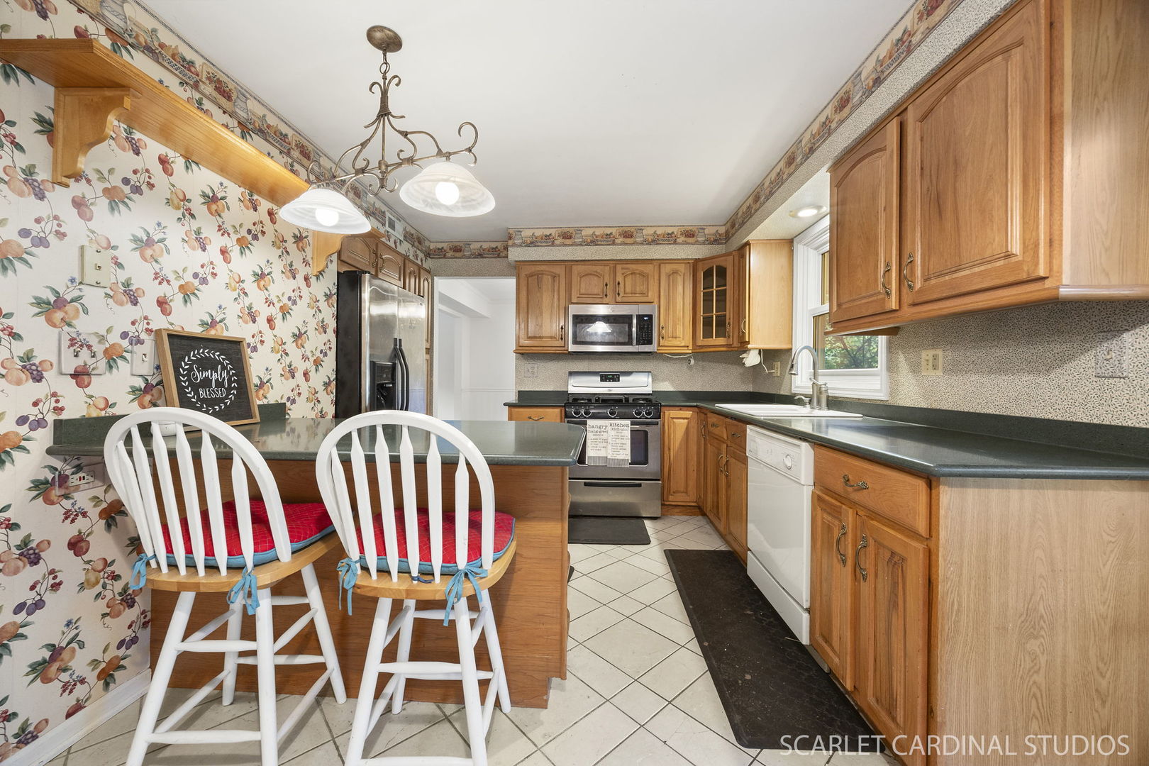 2044 Templar Drive Naperville, IL 60565 - Photo 7 of 28 a group of chairs sitting in a kitchen next to a large window