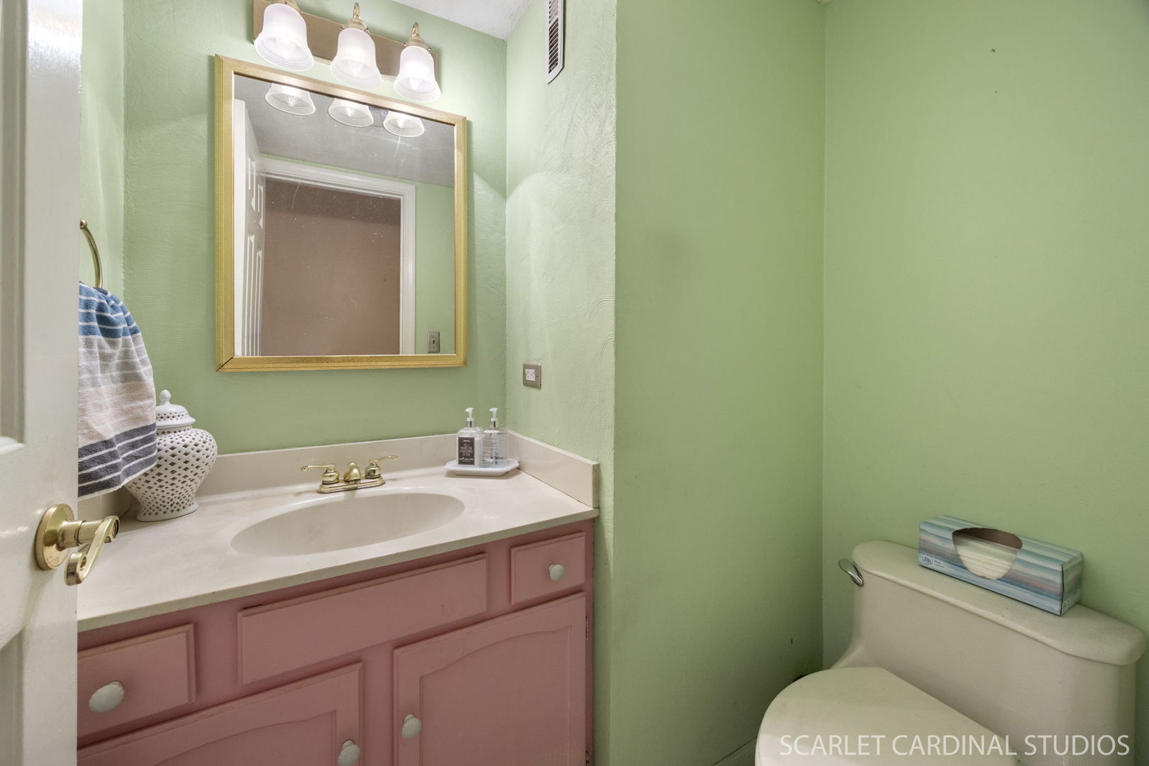 2044 Templar Drive Naperville, IL 60565 - Photo 9 of 28 a bathroom with a sink and a mirror