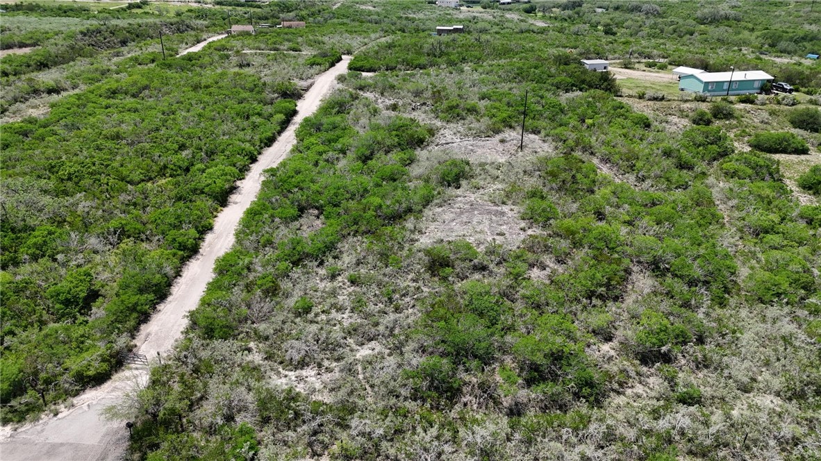 0 Lake Country Drive Mathis, TX 78368 - Photo 5 of 15 an aerial view of residential houses with outdoor space and trees