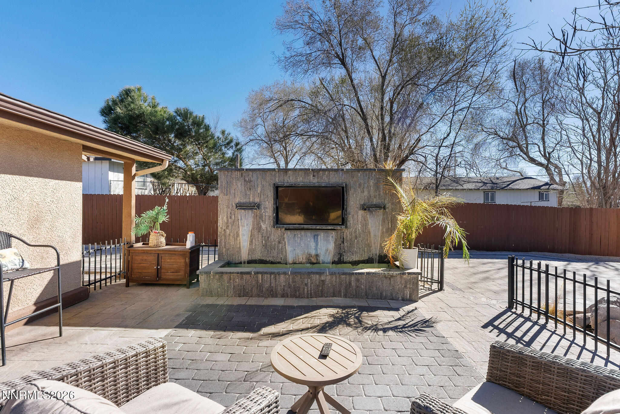 14675 Chamy Drive Reno, NV 89521 - Photo 41 of 86 a view of a patio with couches table and chairs and potted plants