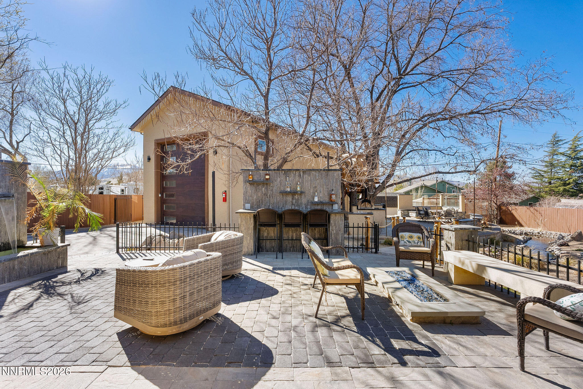 14675 Chamy Drive Reno, NV 89521 - Photo 5 of 86 a view of a patio with couches and table and chairs and potted plants