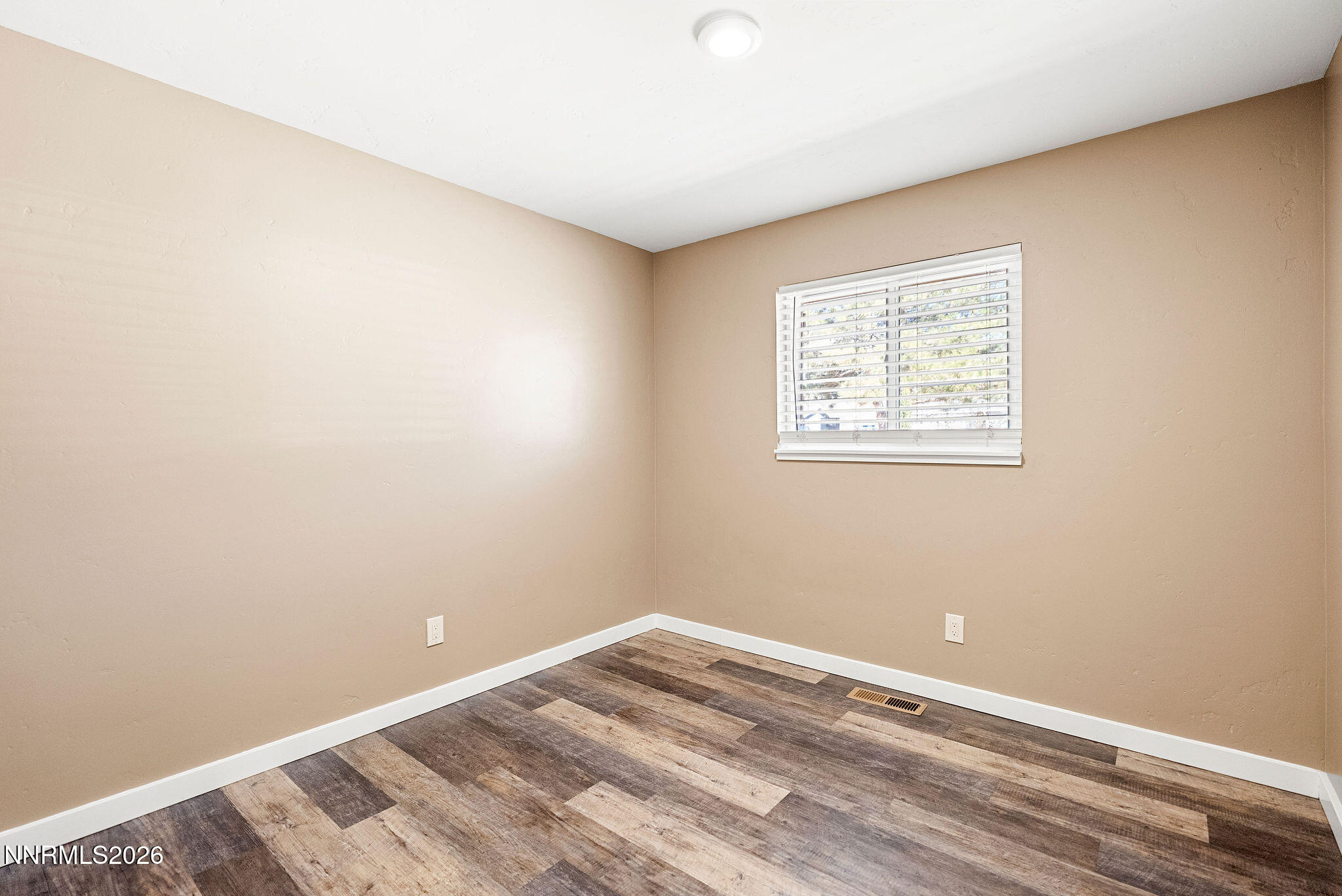 14675 Chamy Drive Reno, NV 89521 - Photo 77 of 86 an empty room with a window