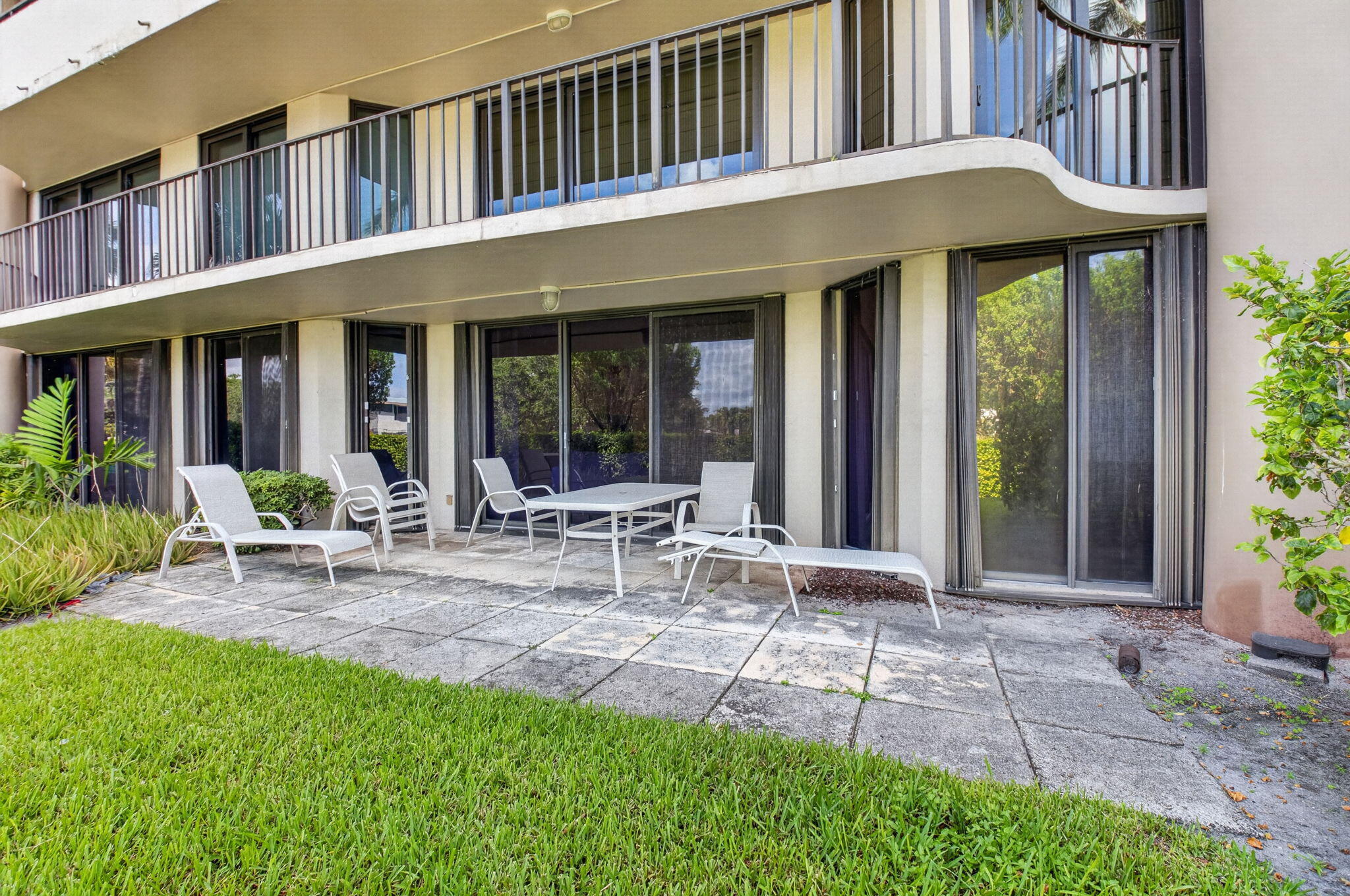 1401 South Ocean Boulevard, Unit 1060 Boca Raton, FL 33432 - Photo 25 of 46 a view of an house with backyard porch and sitting area