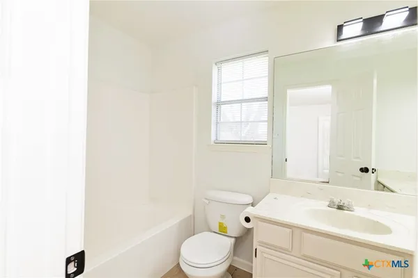 a bathroom with a tub