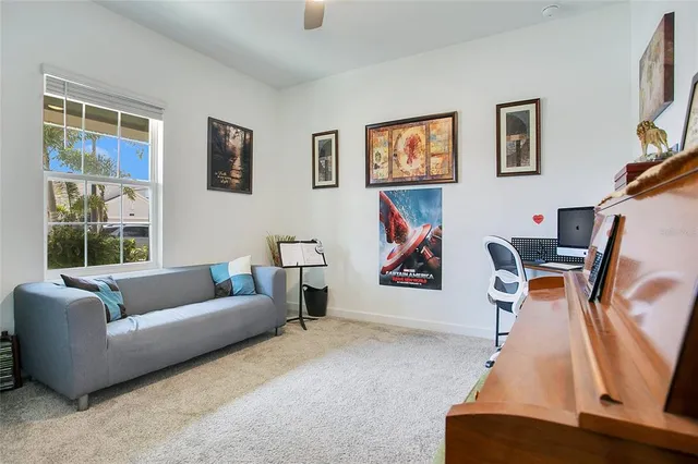a living room with furniture and a window