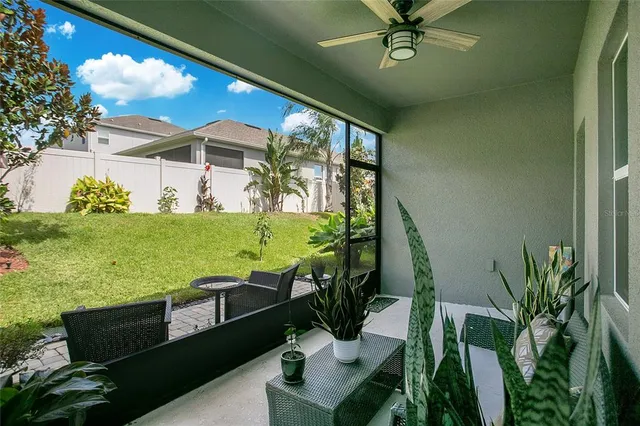 a view of a balcony with chairs