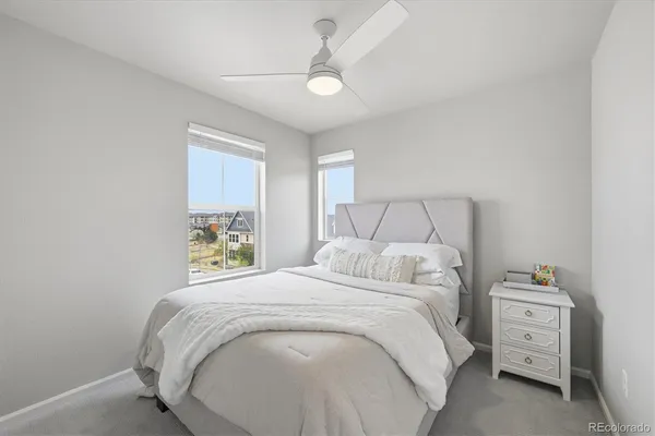 a room with a window and wooden floor