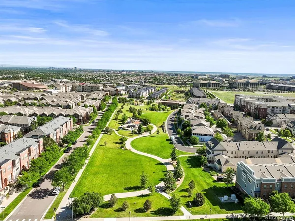 a view of a lake with a yard