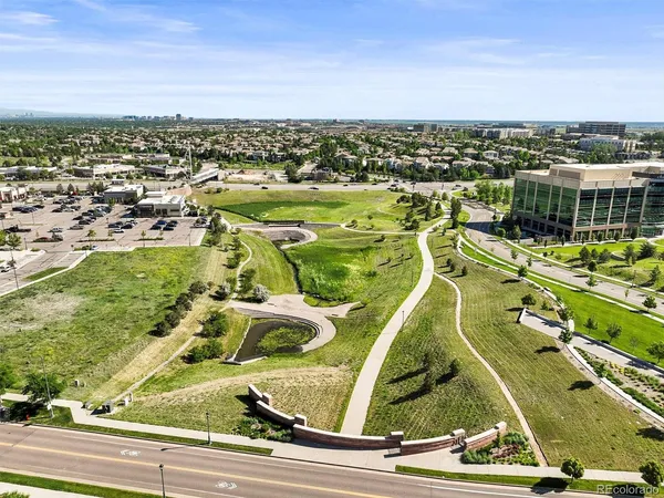 a bathroom with a black and white checkered floor