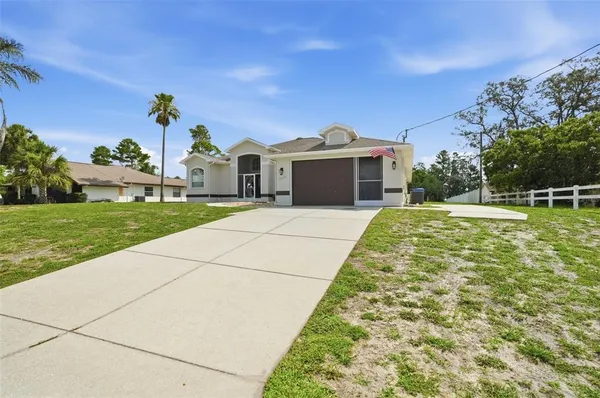 $425,000 | 13339 Drayton Drive, Spring Hill, FL 34609