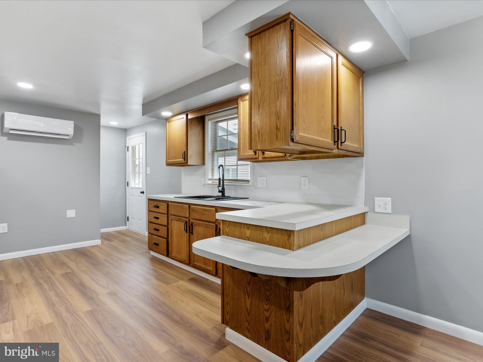 12343 Big Spring Road Clear Spring, MD 21722 - Photo 13 of 34 a kitchen with stainless steel appliances granite countertop a sink a stove a refrigerator and cabinets