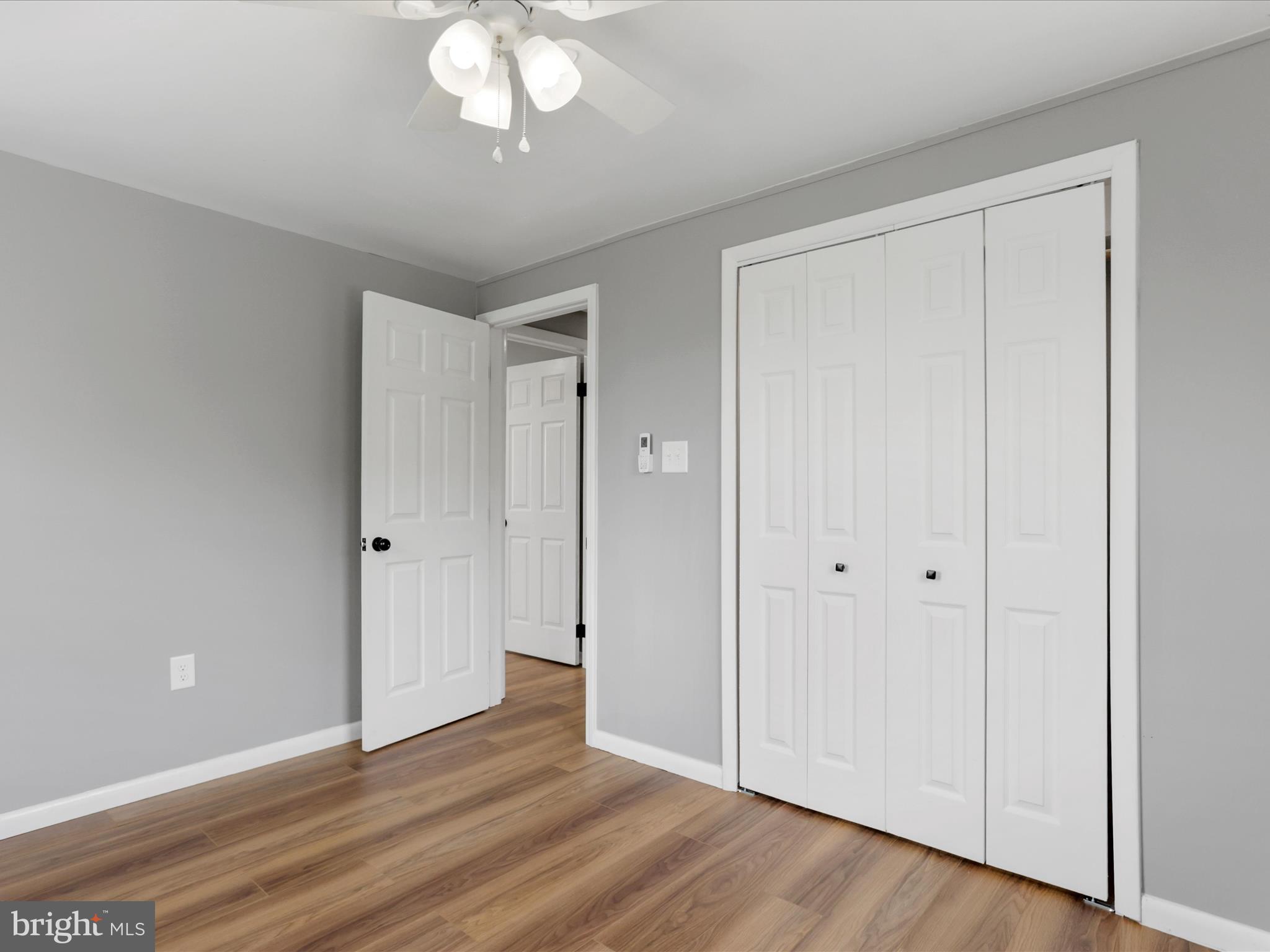 12343 Big Spring Road Clear Spring, MD 21722 - Photo 23 of 34 a view of an empty room with wooden floor