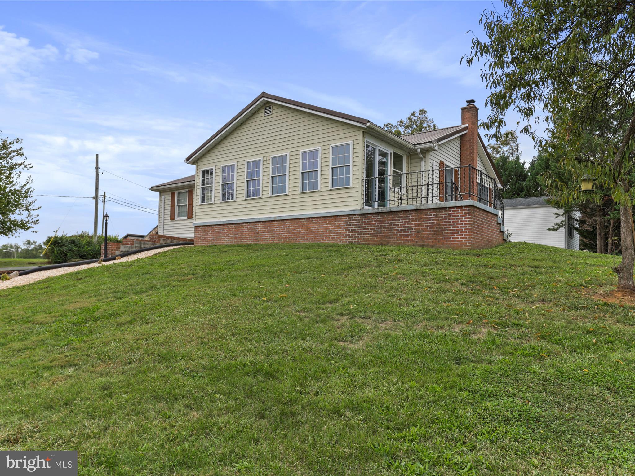 12343 Big Spring Road Clear Spring, MD 21722 - Photo 4 of 34 a view of a house with a yard