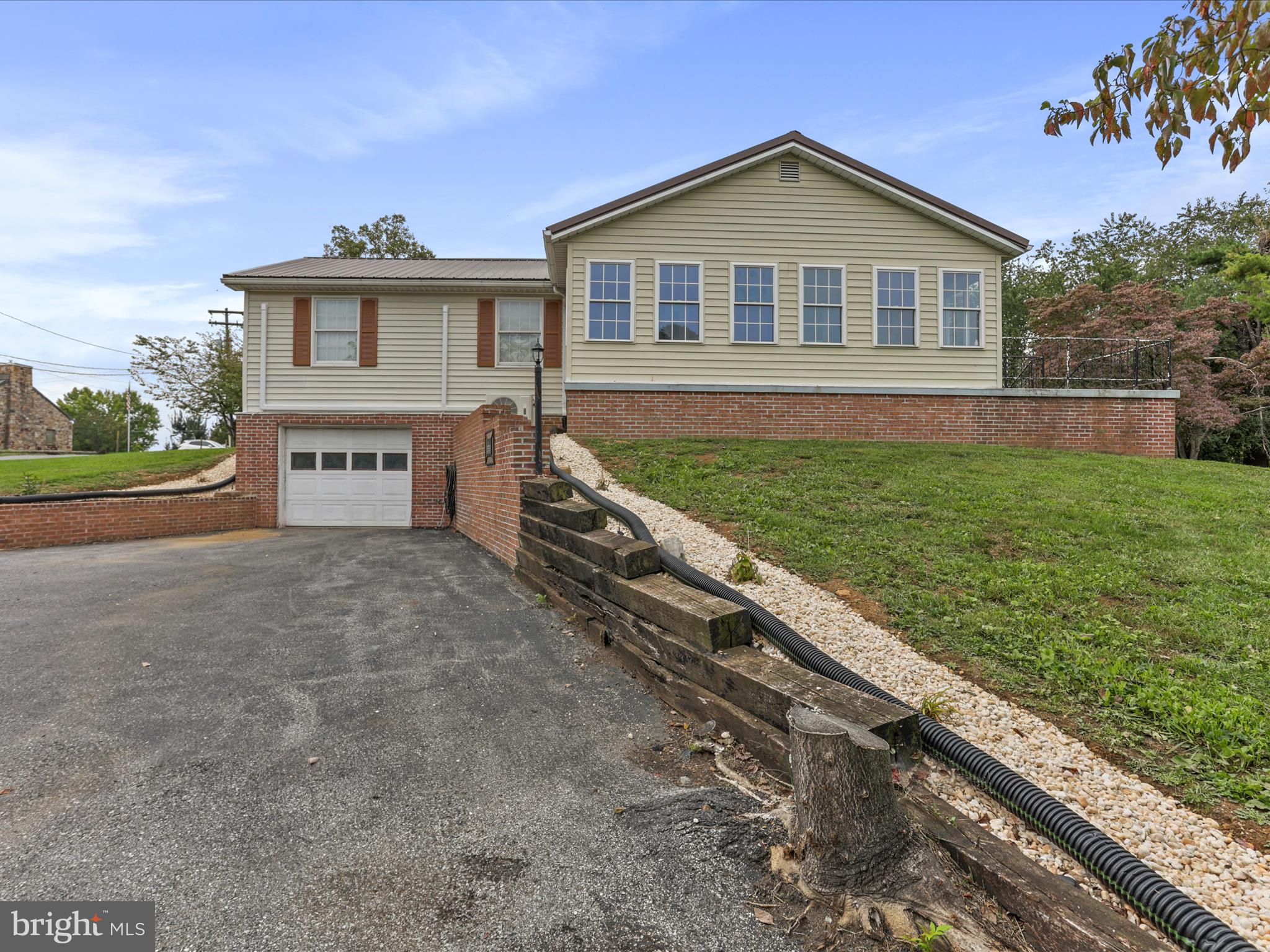 12343 Big Spring Road Clear Spring, MD 21722 - Photo 6 of 34 a view of a house with a yard and a large tree center center island