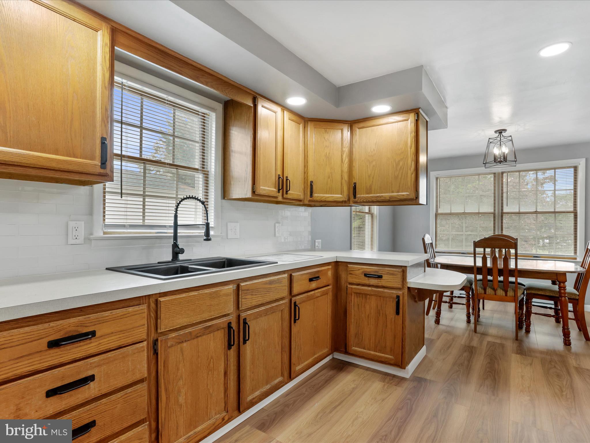 12343 Big Spring Road Clear Spring, MD 21722 - Photo 10 of 34 a kitchen with sink cabinets and wooden floor