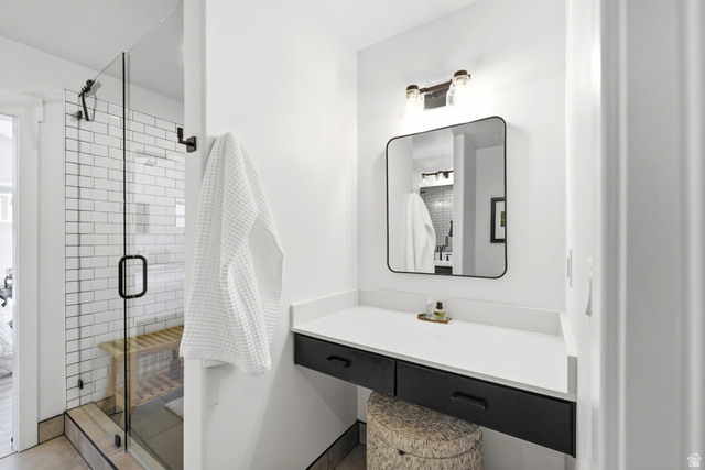 6039 North Westridge Road Heber City, UT 84032 - Photo 28 of 71 Glass-enclosed shower with subway tile surround and built-in bench