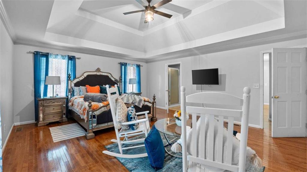 733 Unity Church Road Summerville, GA 30747 - Photo 14 of 75 a bedroom with furniture and a wooden floor