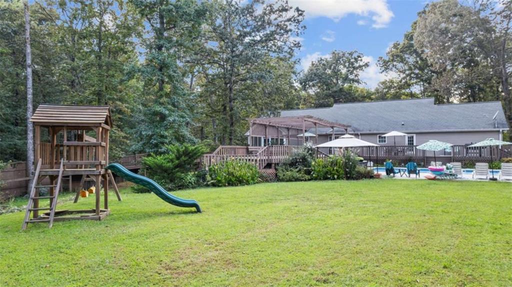 733 Unity Church Road Summerville, GA 30747 - Photo 33 of 75 a view of a house with a backyard