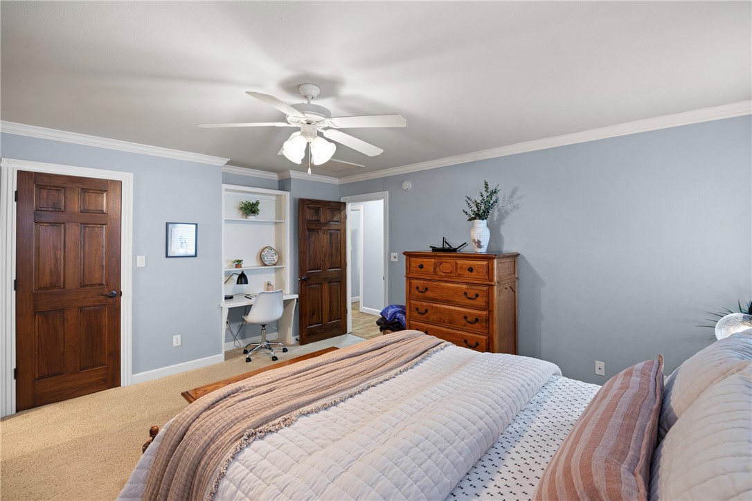 788 Cliff Road Russellville, AR 72802 - Photo 39 of 60 Bedroom with ceiling fan, carpet flooring, crown molding, and an office area