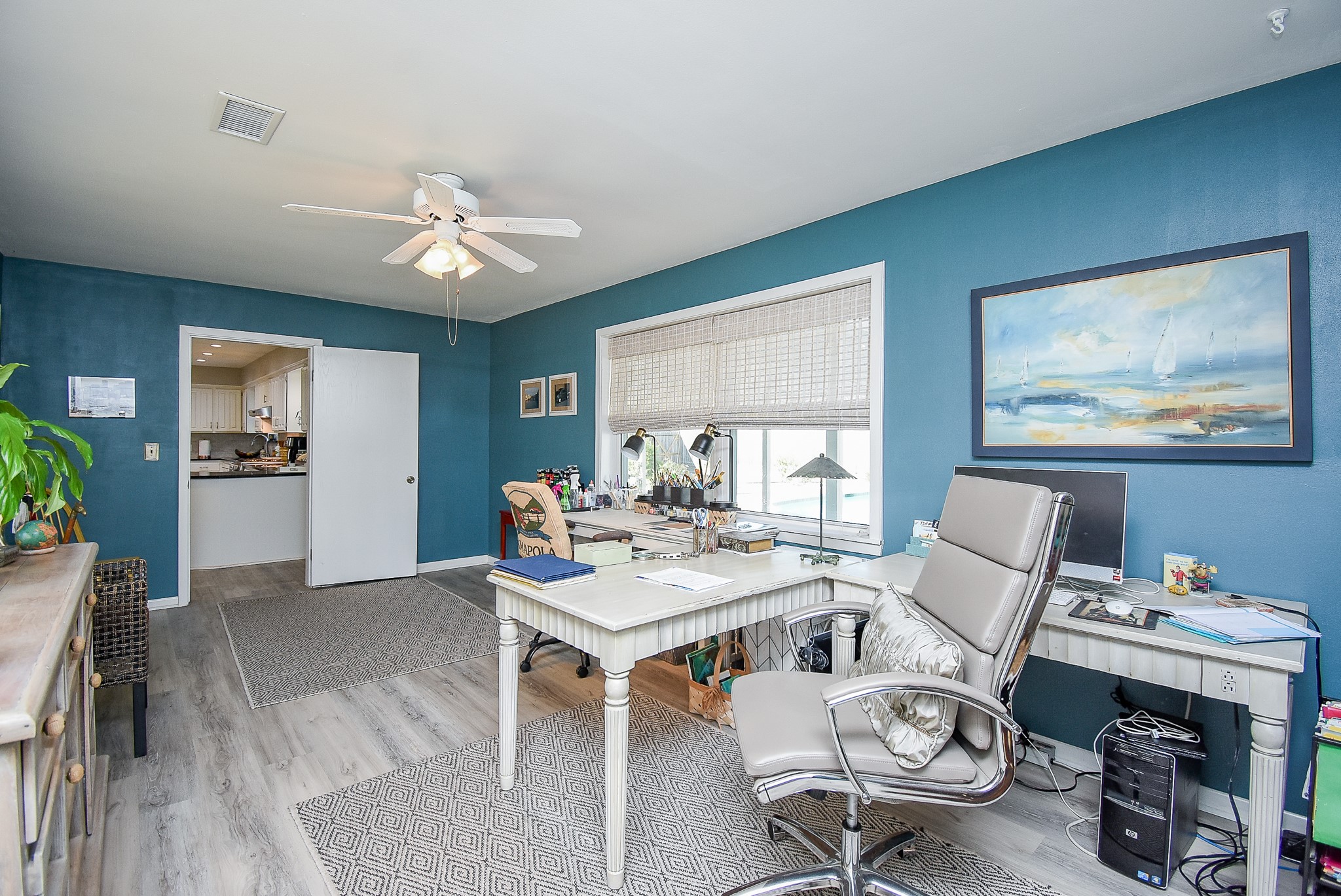 2146 17th Street Hempstead, TX 77445 - Photo 23 of 50 a workspace with furniture window and wooden floor