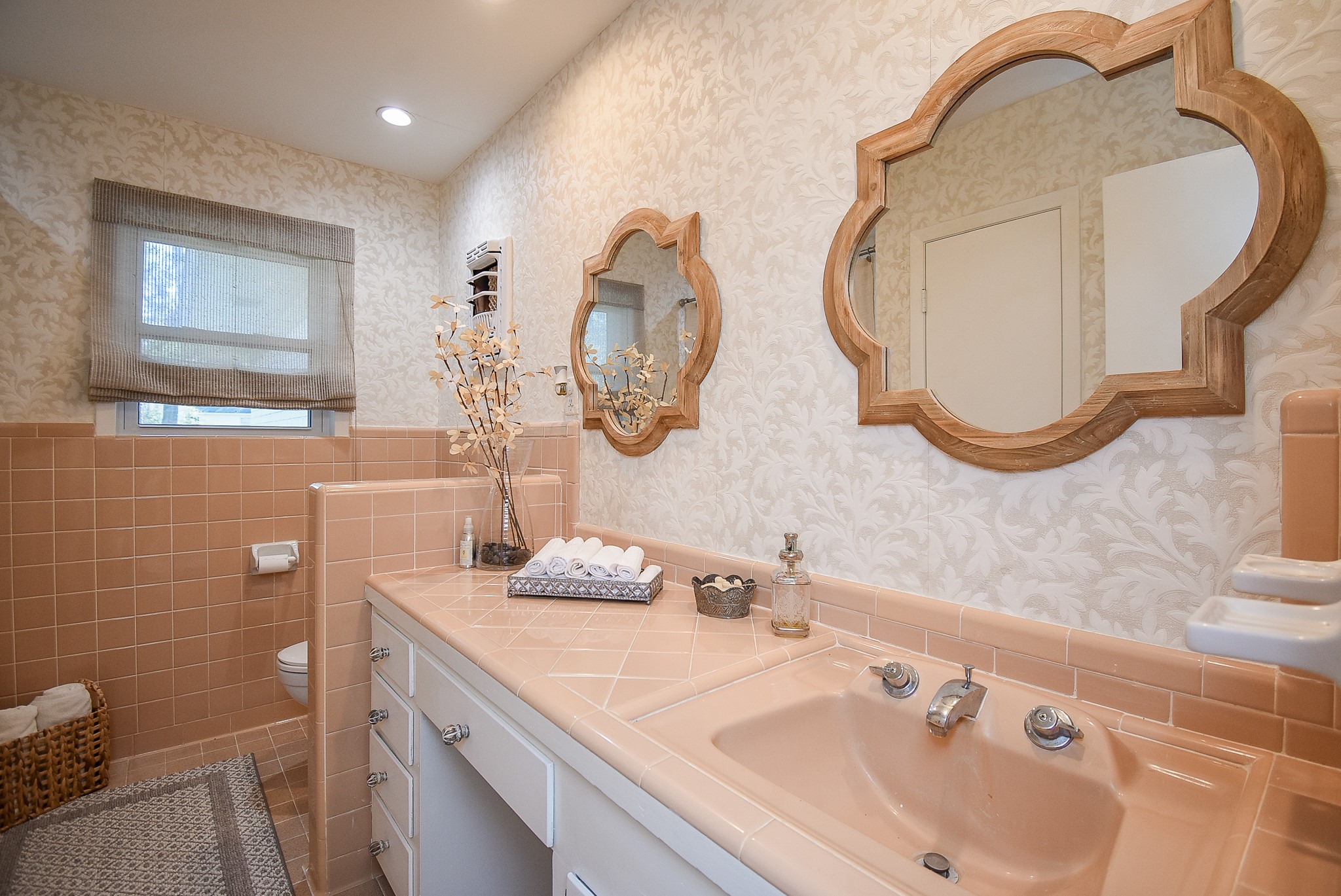 2146 17th Street Hempstead, TX 77445 - Photo 37 of 50 a bathroom with a sink and a mirror