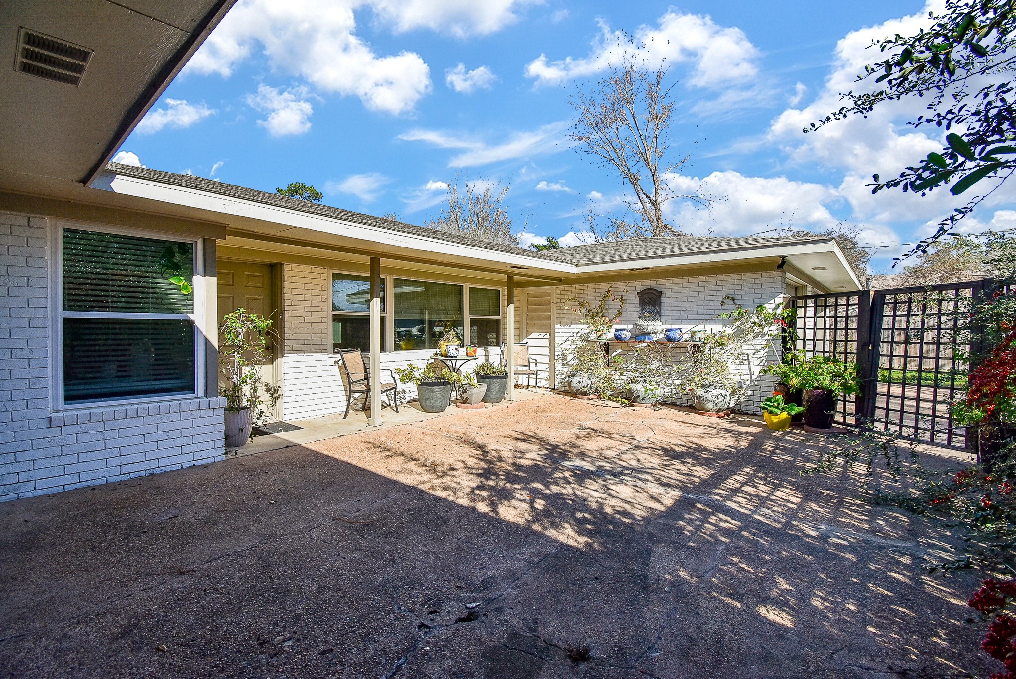 2146 17th Street Hempstead, TX 77445 - Photo 40 of 50 a view of a house with backyard porch and sitting area