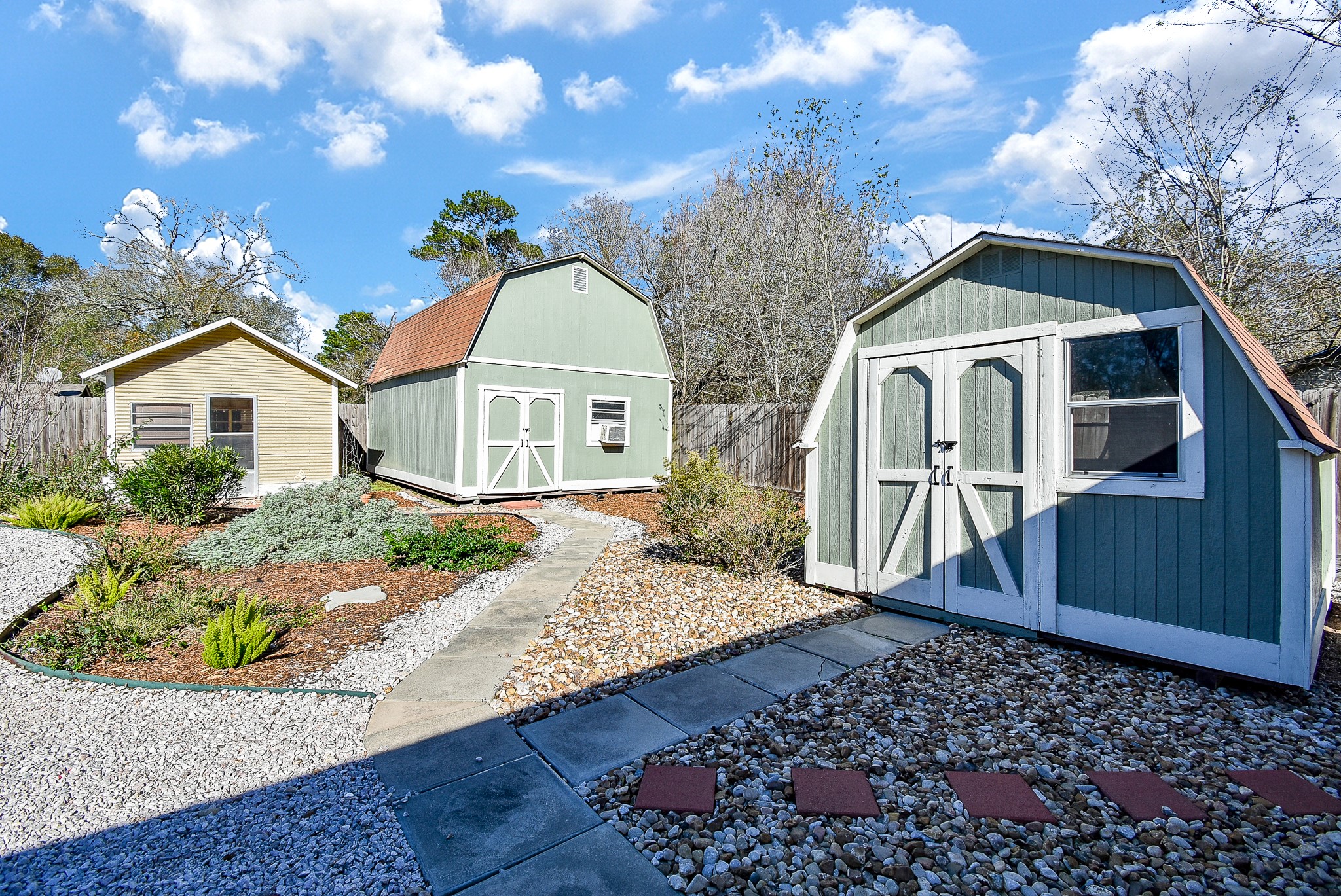 2146 17th Street Hempstead, TX 77445 - Photo 46 of 50 a front view of a house with garden