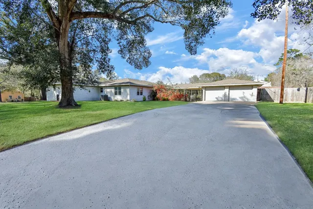 a view of house with outdoor space and street view