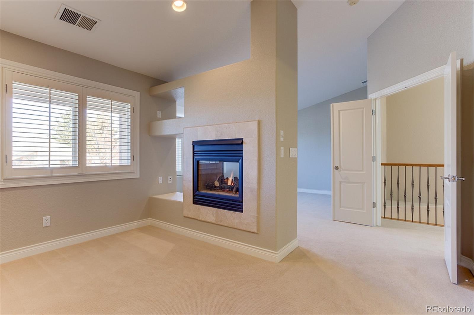 338 St Paul Street Denver, CO 80206 - Photo 16 of 35 a view of an empty room with a window