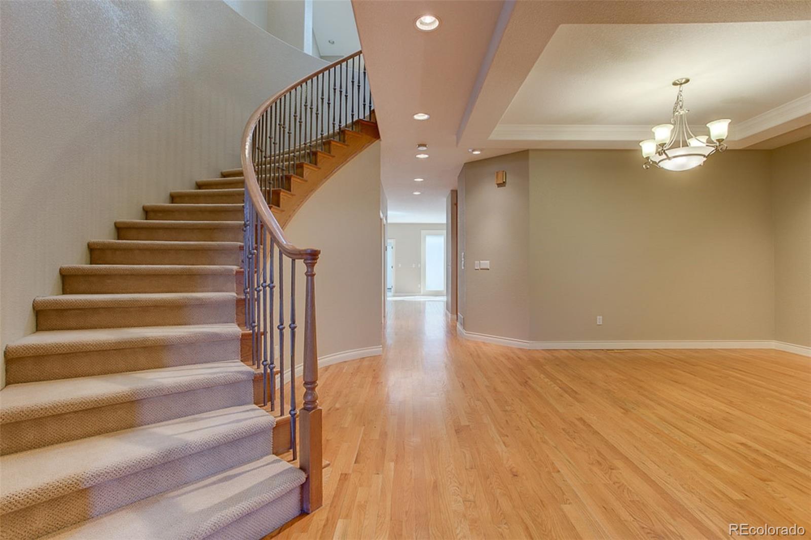 338 St Paul Street Denver, CO 80206 - Photo 5 of 35 a view of entryway and hall with wooden floor