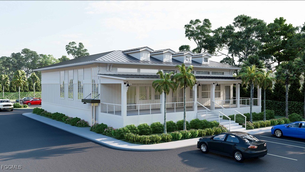 1625 Periwinkle Way Sanibel, FL 33957 - Photo 9 of 15 a view of a house with a garden and plants