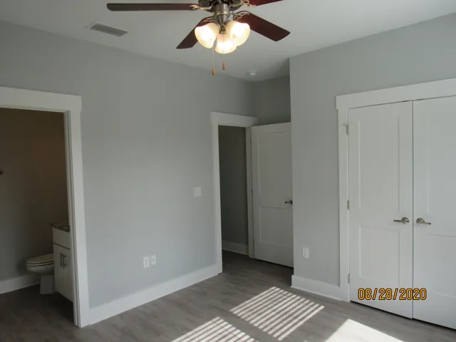 a view of an empty room and window