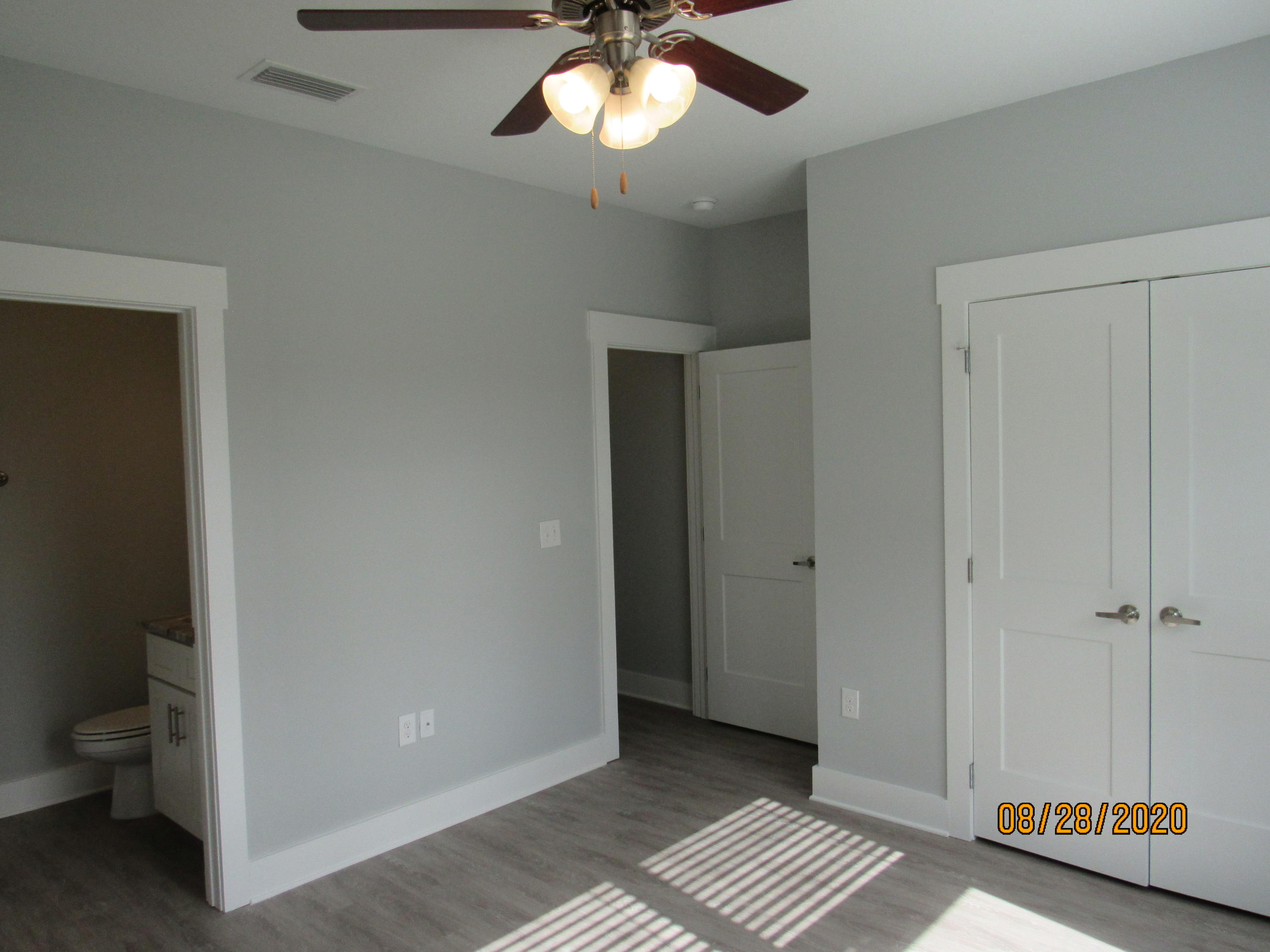 69 South Sand Palm Road Freeport, FL 32439 - Photo 7 of 13 a view of an empty room and window