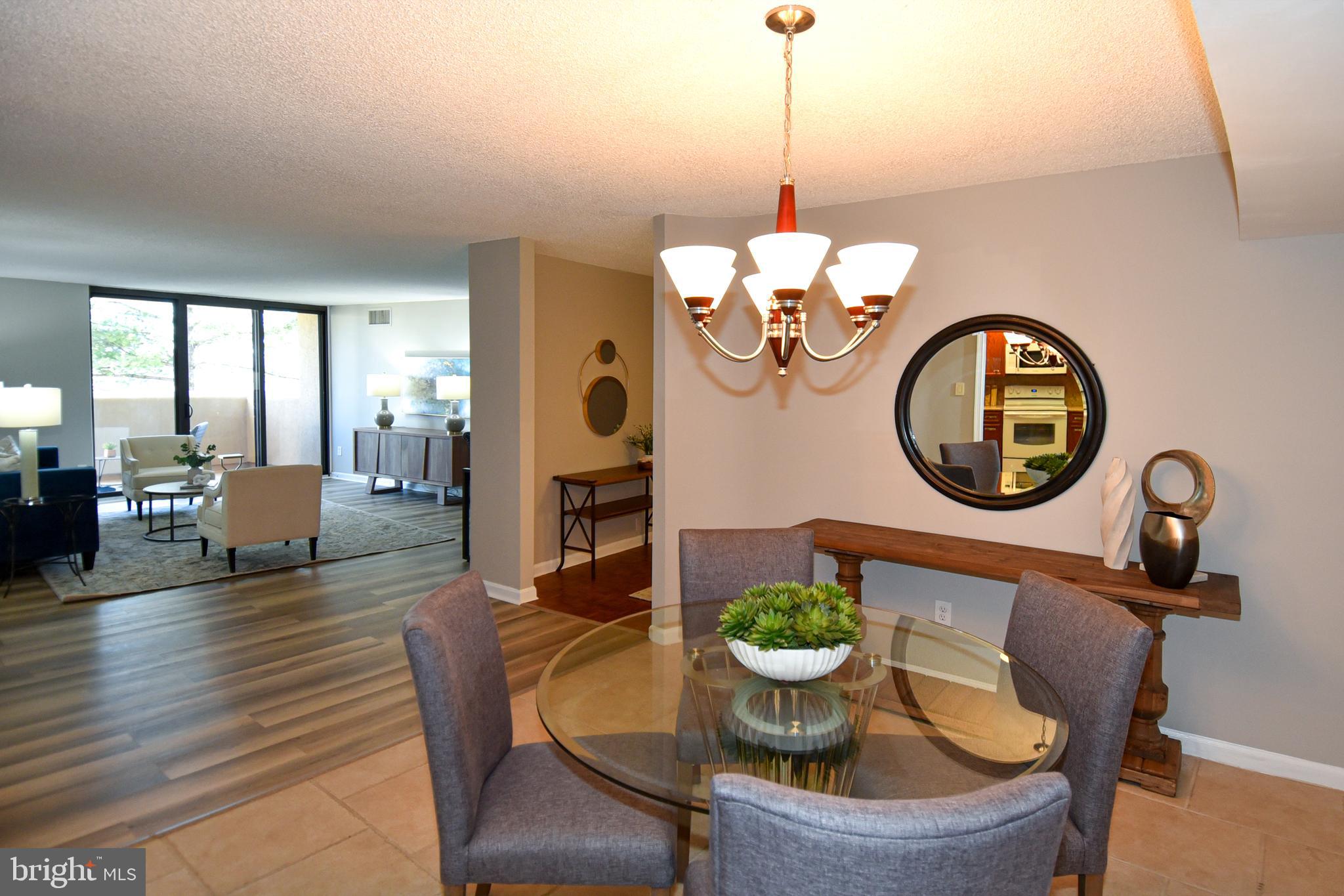 1101 South Arlington Ridge Road, Unit 305 Arlington, VA 22202 - Photo 12 of 57 Dining Room View to Living Room
