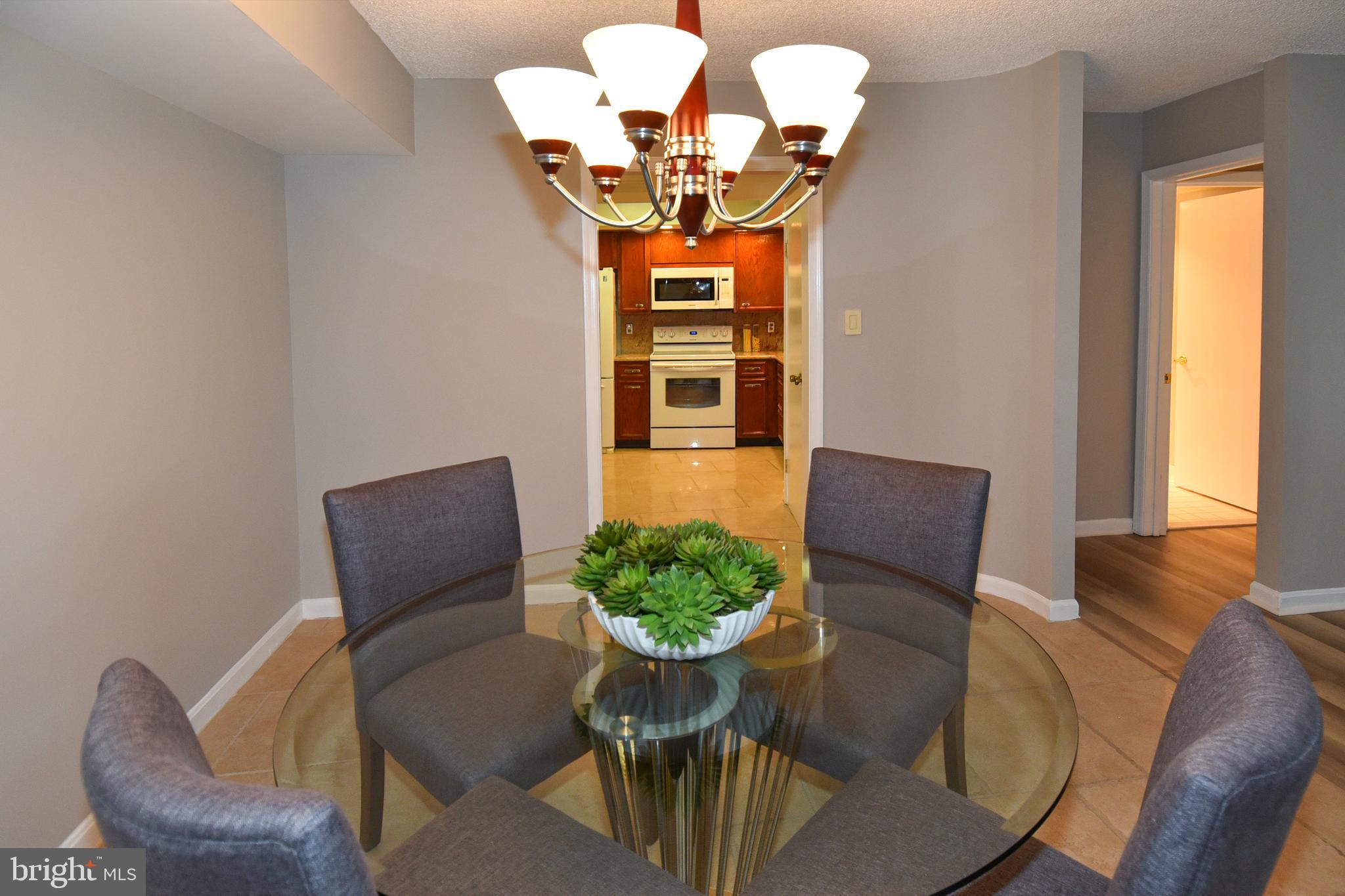 1101 South Arlington Ridge Road, Unit 305 Arlington, VA 22202 - Photo 13 of 57 Dining Room View to Kitchen