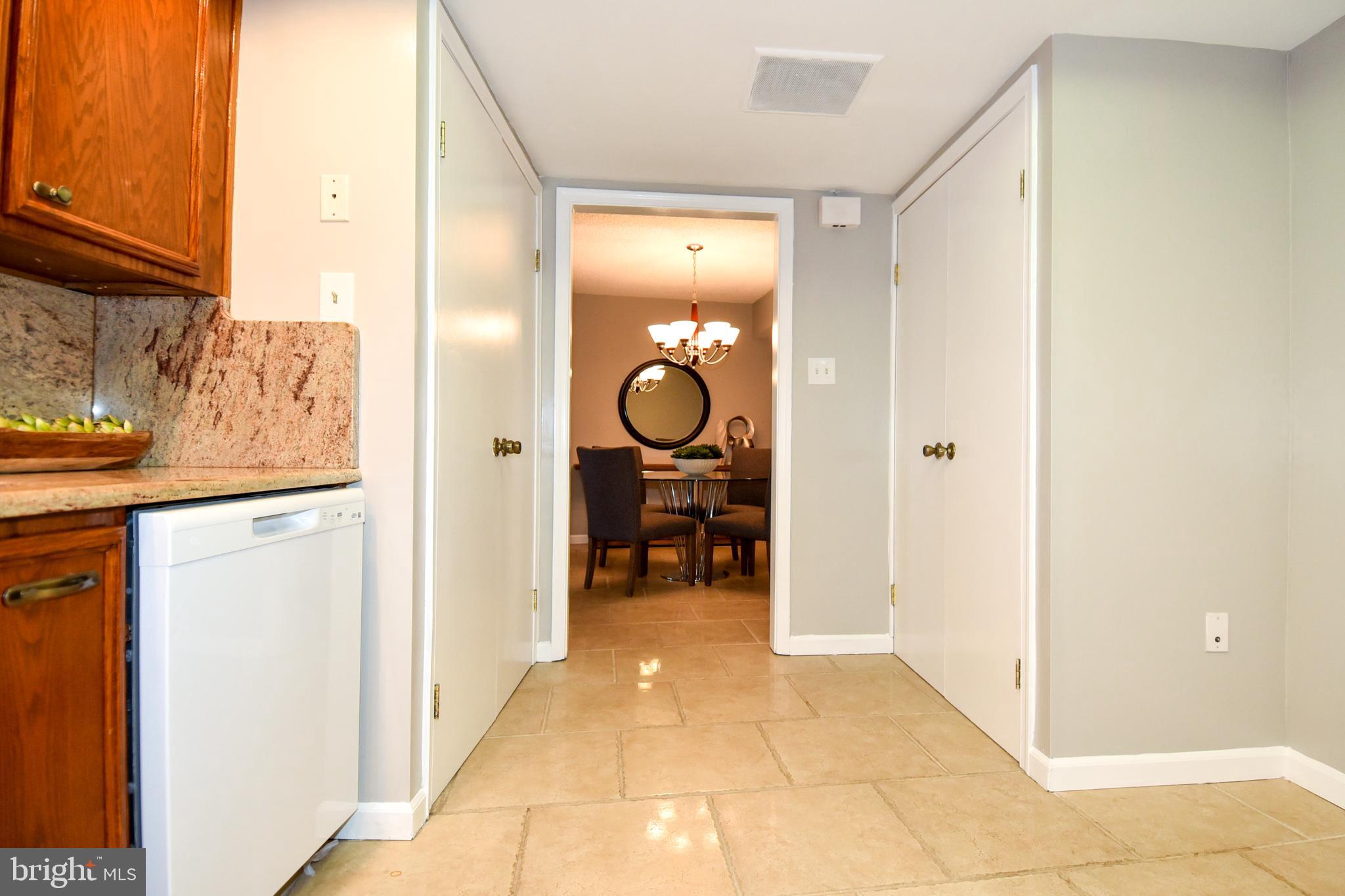 1101 South Arlington Ridge Road, Unit 305 Arlington, VA 22202 - Photo 18 of 57 Kitchen with view into Dining Room -- Tile Floorin