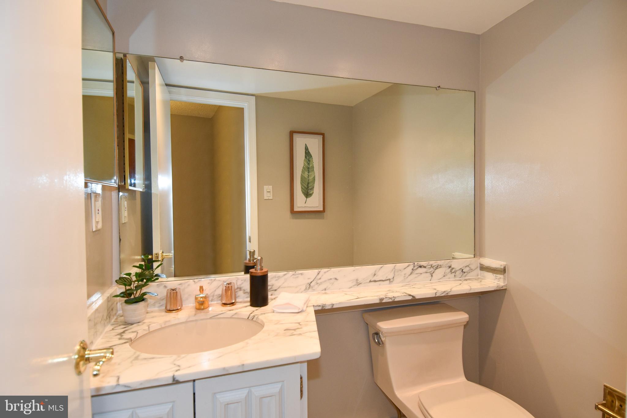 1101 South Arlington Ridge Road, Unit 305 Arlington, VA 22202 - Photo 20 of 57 Half Bath off of Foyer