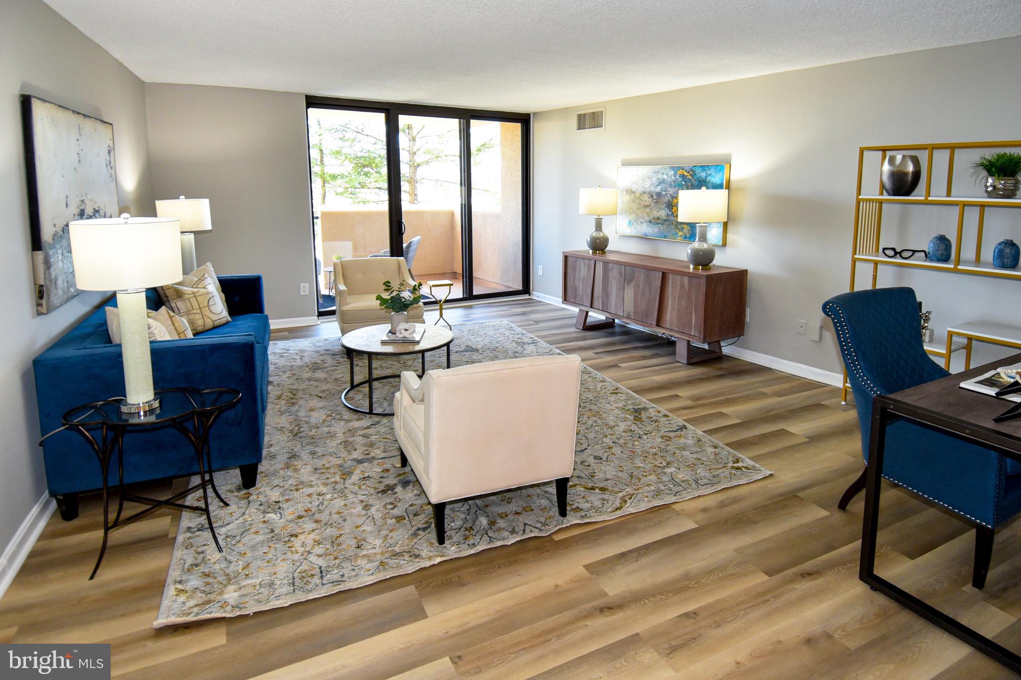 1101 South Arlington Ridge Road, Unit 305 Arlington, VA 22202 - Photo 2 of 57 Living Room with new Luxury Vinyl Flooring