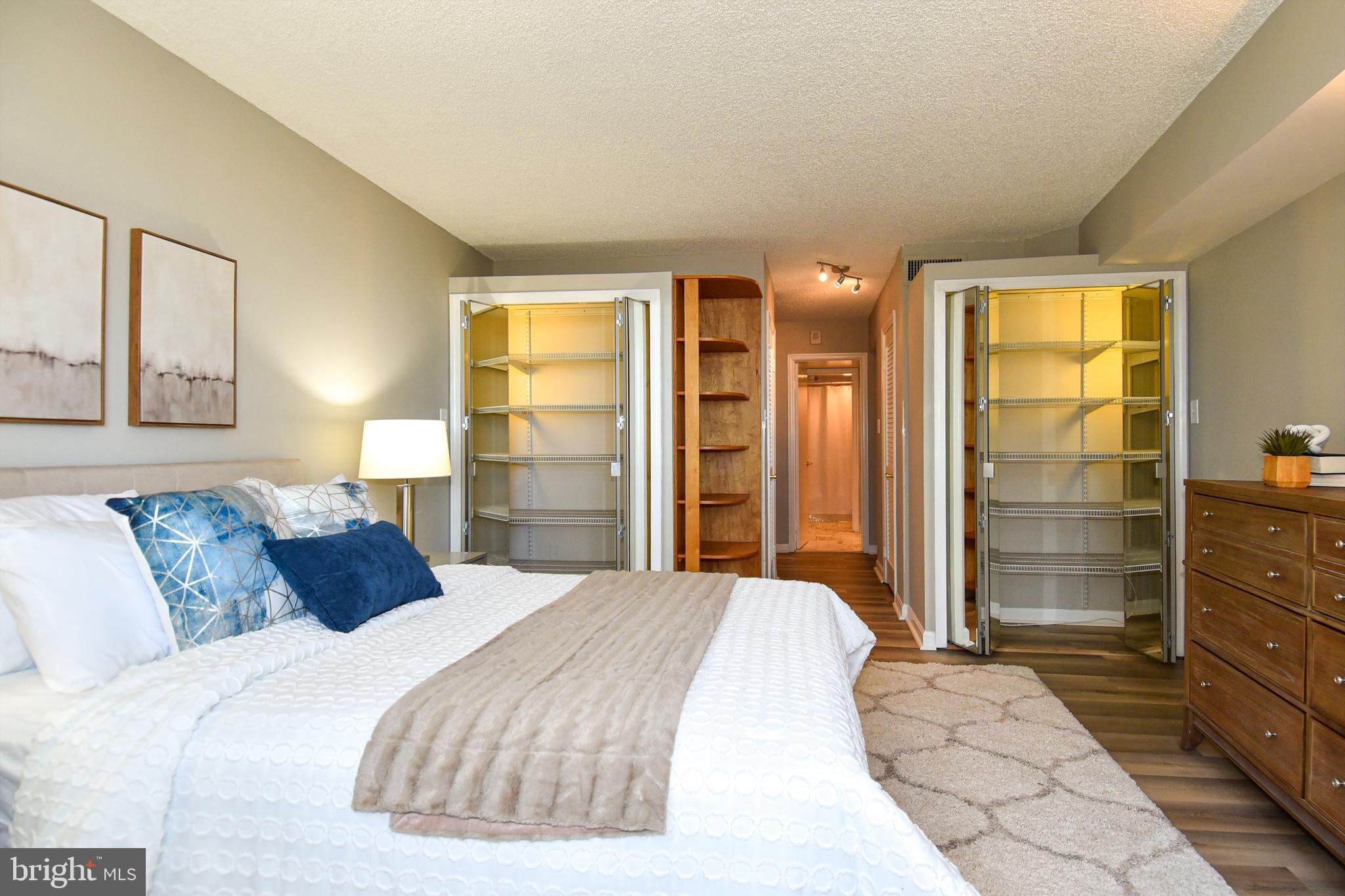 1101 South Arlington Ridge Road, Unit 305 Arlington, VA 22202 - Photo 24 of 57 Primary Bedroom 2-shelved closets