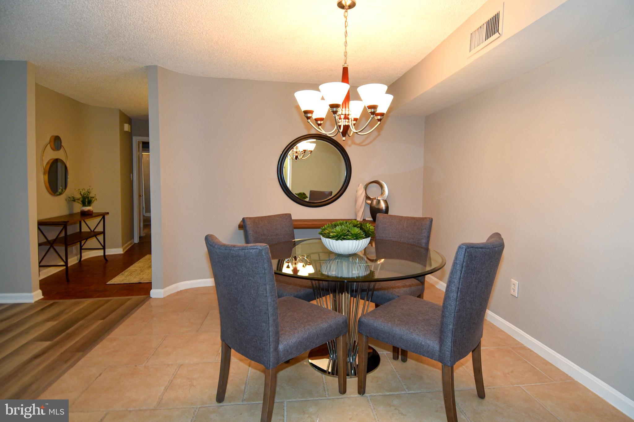 1101 South Arlington Ridge Road, Unit 305 Arlington, VA 22202 - Photo 3 of 57 Dining Room with tile flooring